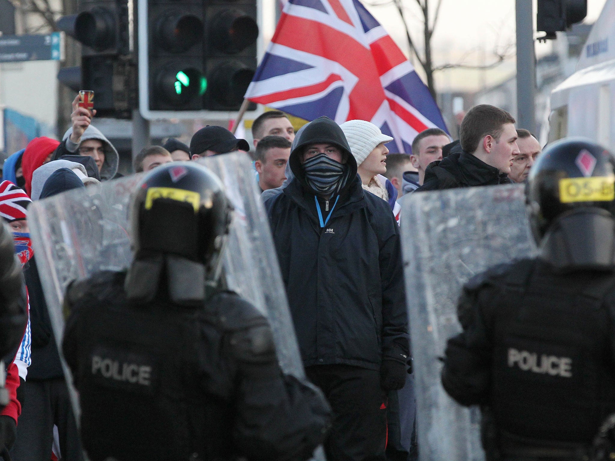 Loyalist protesters with Union flags in East Belfast in January 2012