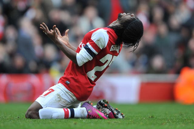 Rover and out: Gervinho shows his frustration after missing a glorious chance for Arsenal during their surprise 1-0 FA Cup fifth-round defeat against Blackburn Rovers at Emirates Stadium yesterday 