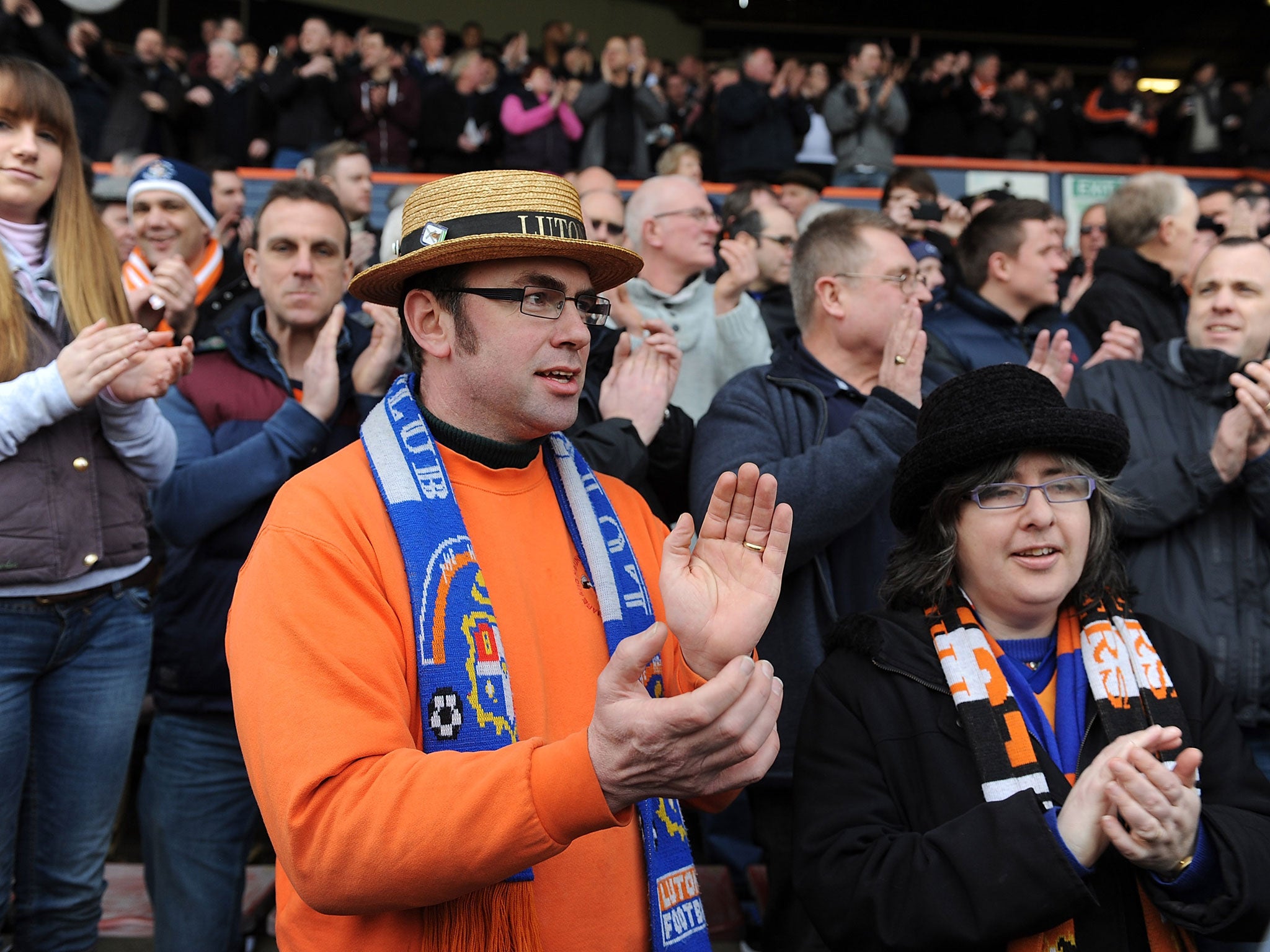 <b>Luton 0-3 Millwall</b><br/>A Luton Town supporter wears a straw hat as he enjoys the atmosphere before the FA Cup with Budweiser Fifth Round Match between Luton Town and Millwall FC