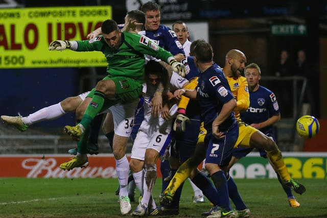 <b>Oldham 2-2 Everton</b><br/>Matt Smith of Oldham Athletic scores his team's second goal to make the score 2-2 