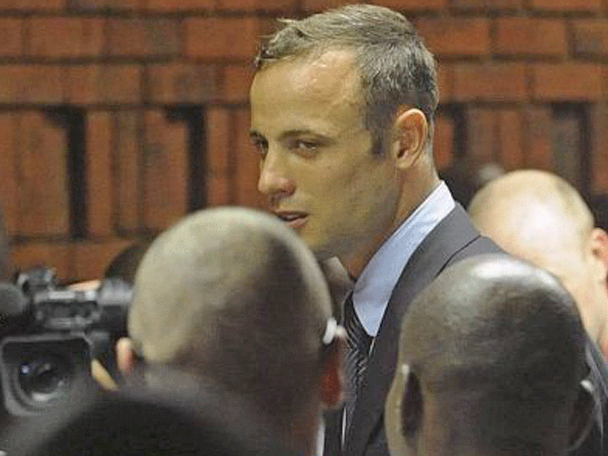 Oscar Pistorius in the Pretoria magistrates court after spending a
night in police custody