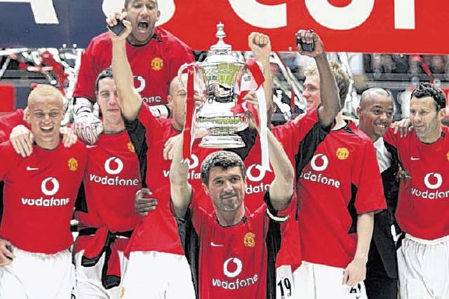 Roy Keane holds aloft the trophy the last time United won the FA Cup