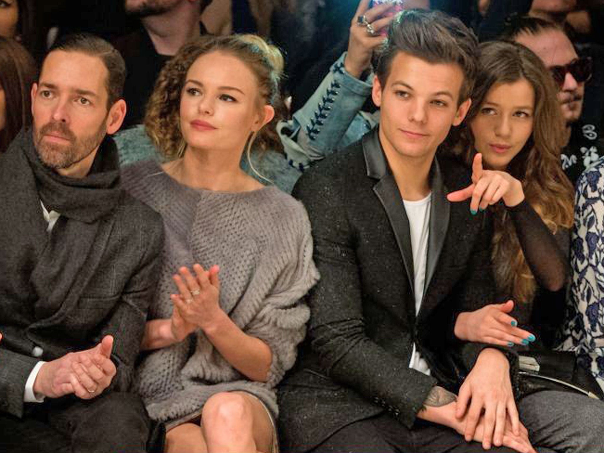 Michael Polish, Kate Bosworth, Louis Tomlinson of One Direction and Eleanor Calder attend the Topshop Unique show at the Tate Modern