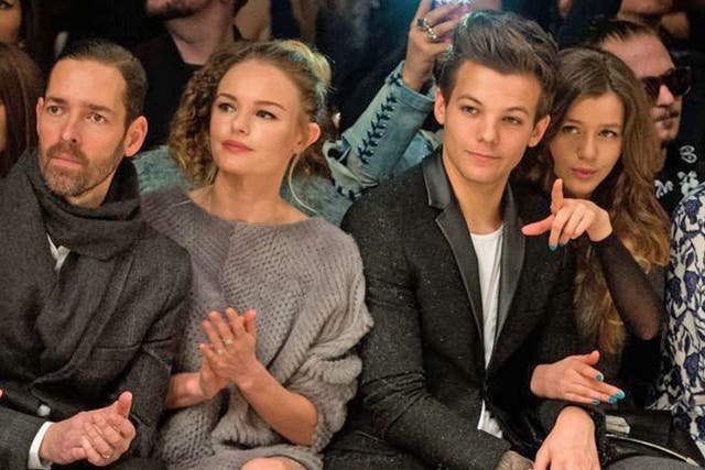 Michael Polish, Kate Bosworth, Louis Tomlinson of One Direction and Eleanor Calder attend the Topshop Unique show at the Tate Modern