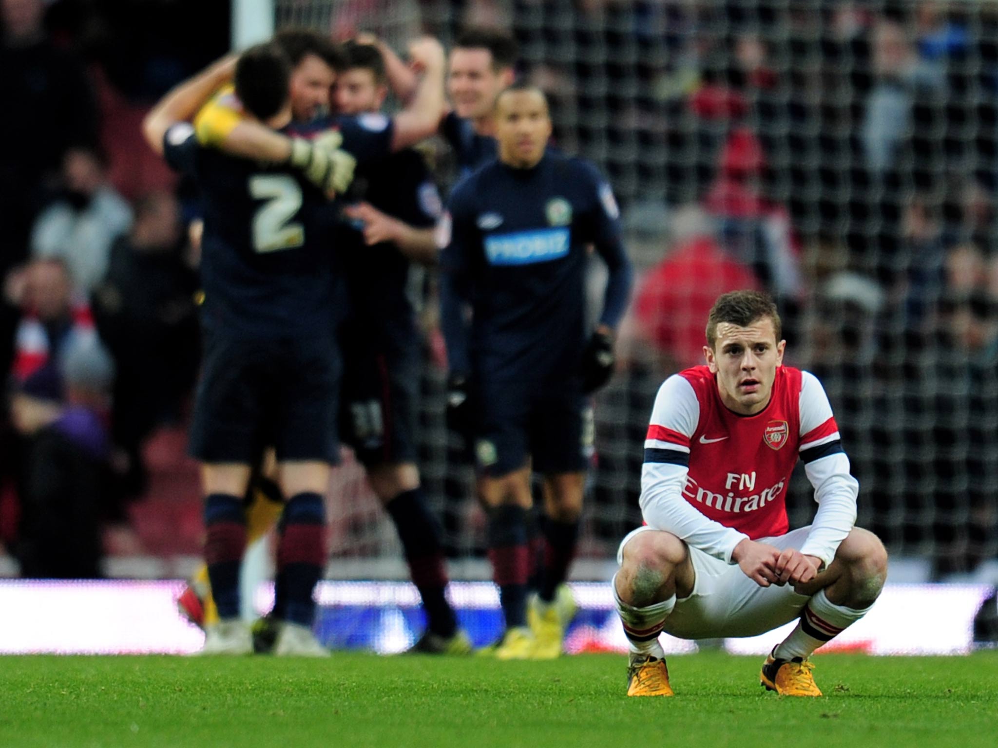 Arsenal midfielder Jack Wilshere takes in the defeat to Blackburn