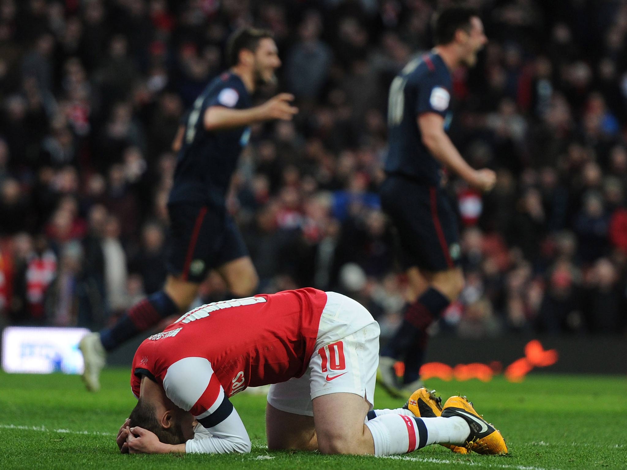 Jack Wilshere reacts during the defeat to Blackburn in the FA Cup