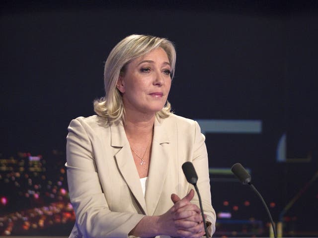 President of French far-right party Front national (FN) and candidate for the 2012 French presidential election Marine Le Pen takes part in the broadcast news of French TV channel TF1 in Boulogne-Billancourt, outside Paris on February 17, 2012.