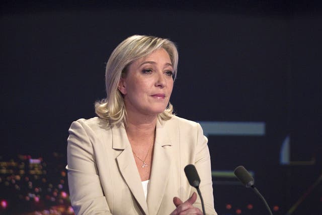 President of French far-right party Front national (FN) and candidate for the 2012 French presidential election Marine Le Pen takes part in the broadcast news of French TV channel TF1 in Boulogne-Billancourt, outside Paris on February 17, 2012.