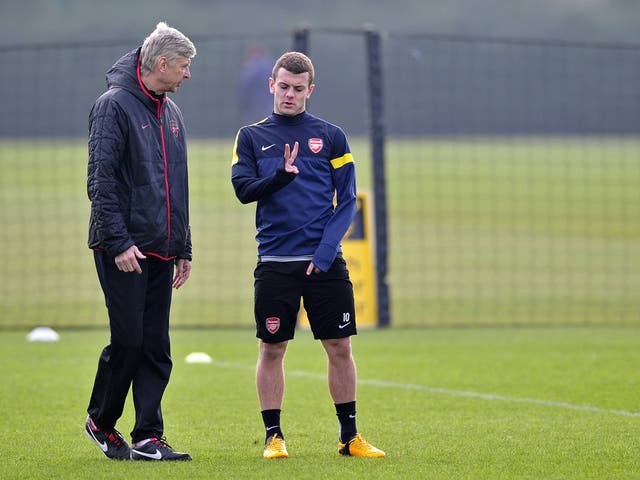 Arsene Wenger and Jack Wilshere pictured training for Arsenal