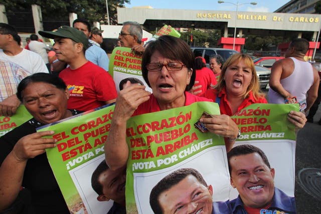 Supporters of Venezuela's President Hugo Chavez celebrate his return
