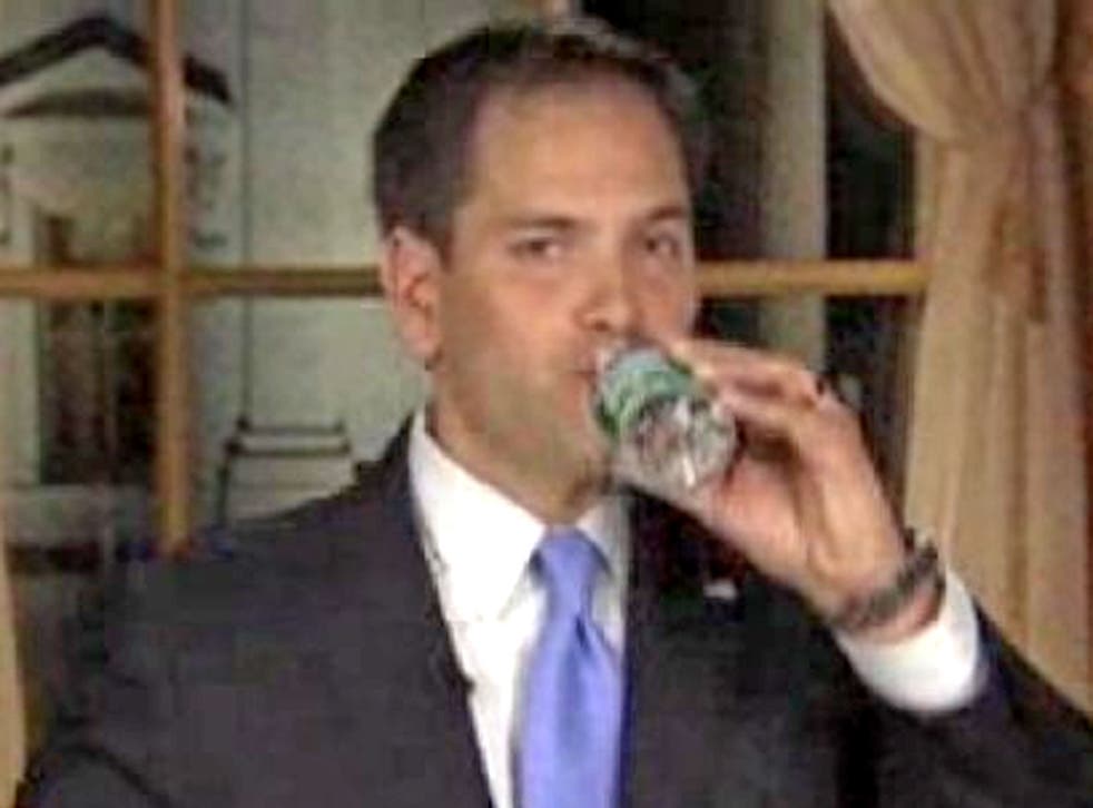 Florida Senator Marco Rubio takes a sip of water during his Republican response to President Barack Obama's State of the Union address