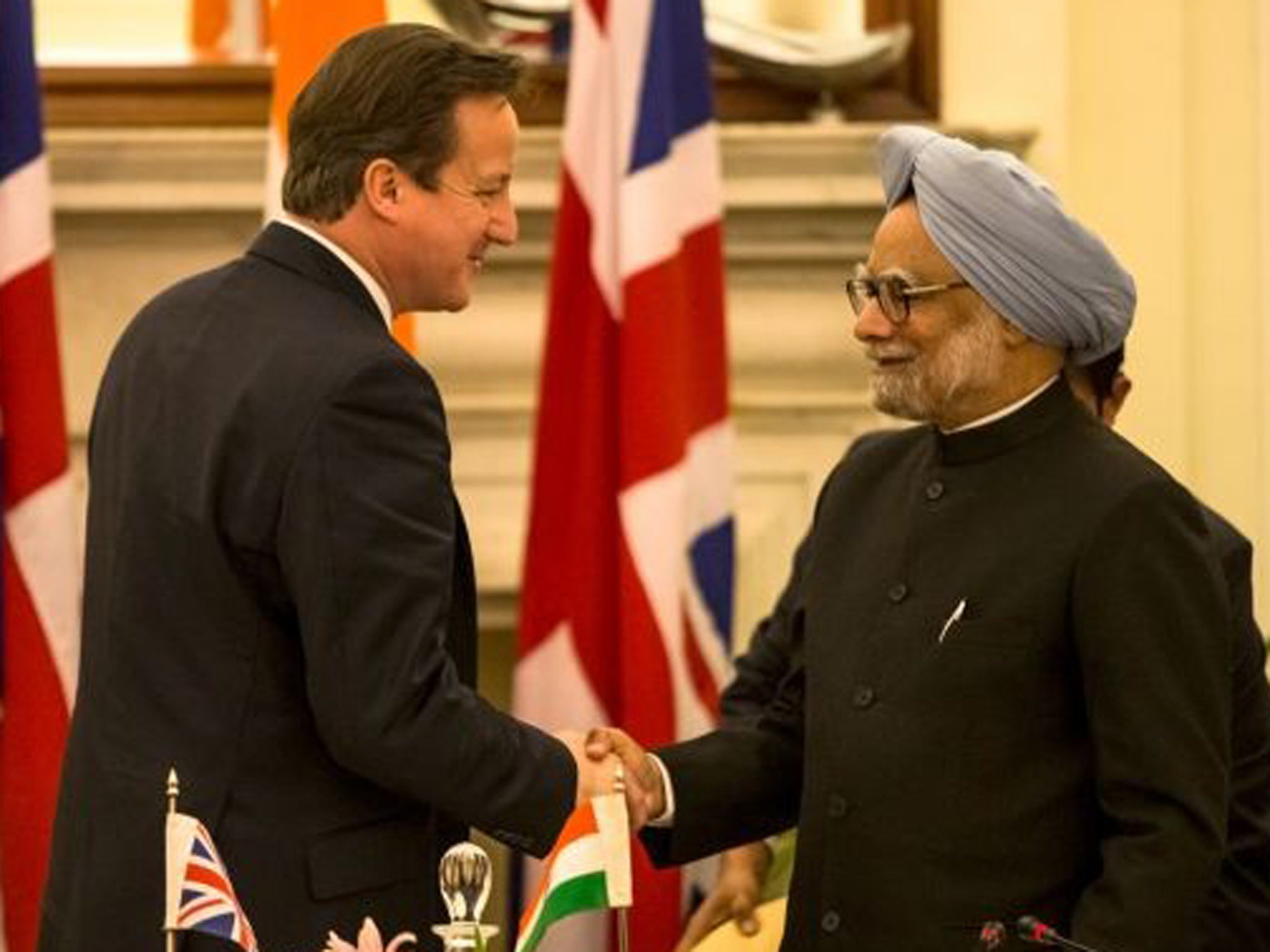 David Cameron met with Indian premier Manmohan Singh in Mumbai