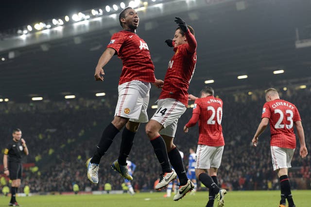 Anderson and Javi Hernandez celebrate during Manchester United's victory over Reading
