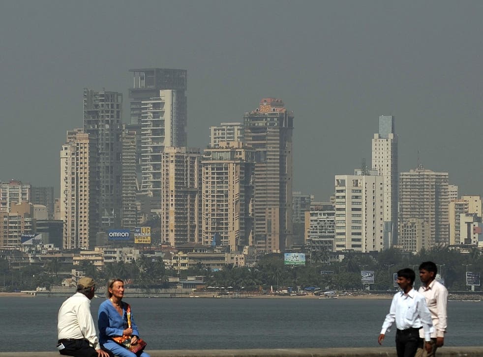 The Mumbai city skyline is seen from a seaside promenade in Mumbai on January 12, 2012.