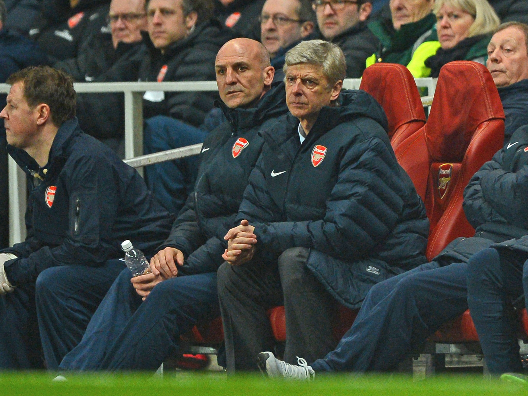 Arsene Wenger watches Arsenal slide to defeat at the Emirates last night