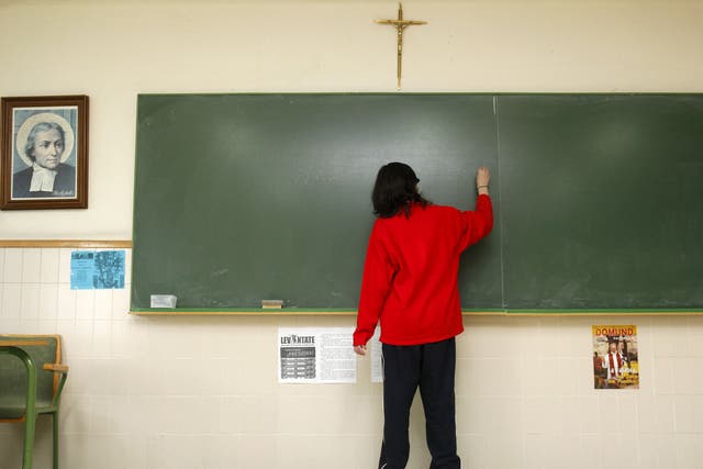 A crucifix hangs on the wall of a classroom in a school of the city of Burgos, northern Spain, on December 3, 2009.