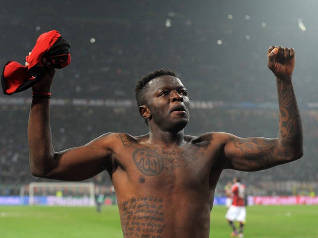 Sulley Ali Muntari celebrates at the end of the Champions League clash between AC Milan and Barcelona