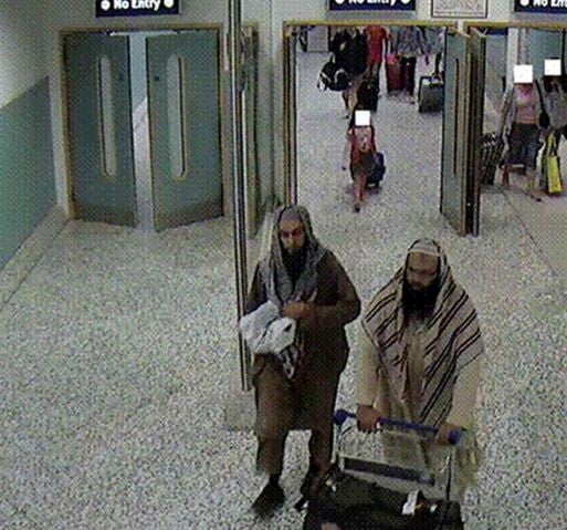 Irfan Khalid and Irfan Naseer arriving at Birmingham airport