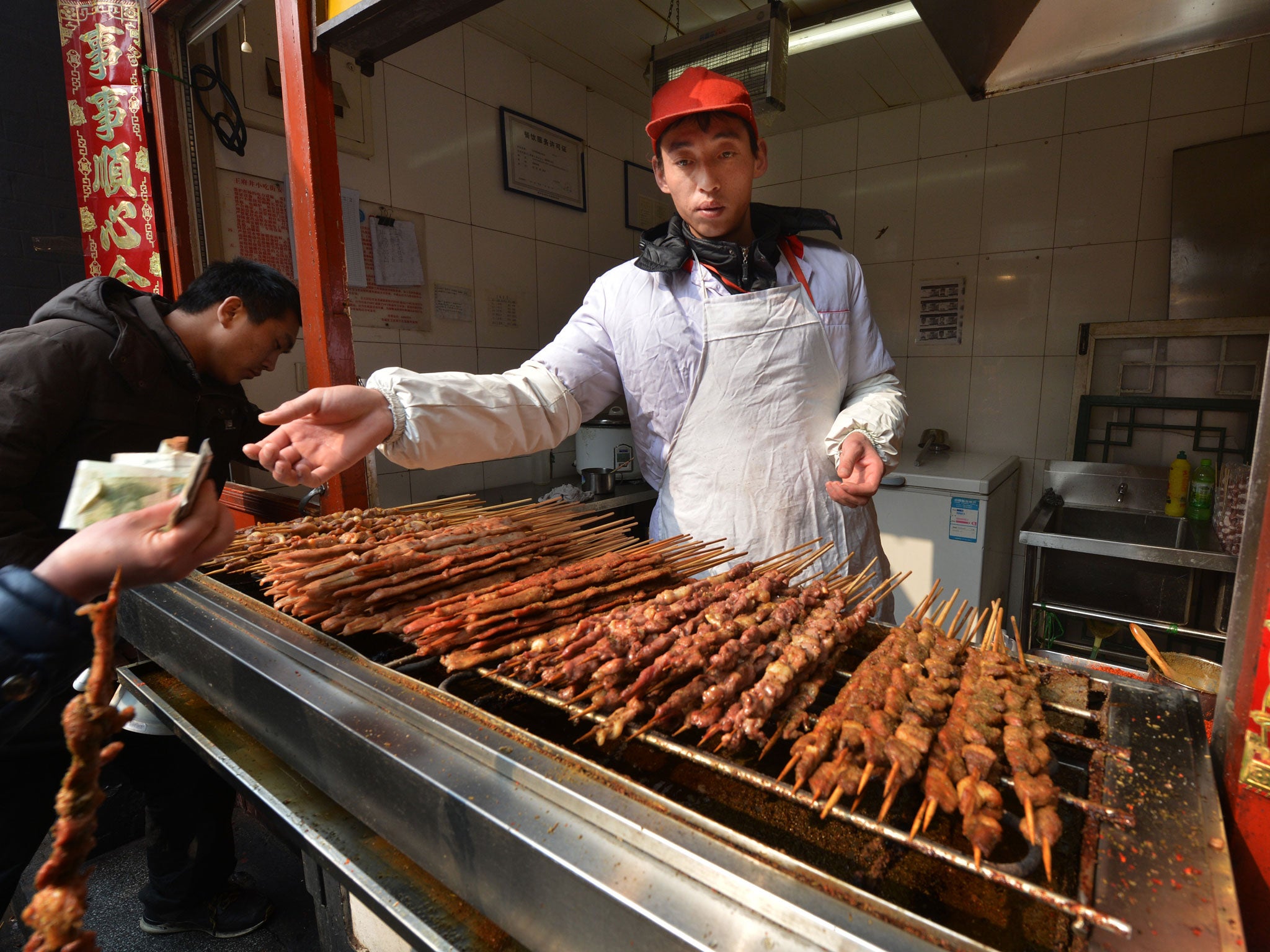 Hawkers selling barbecued goods like these lamb kebabs may be a thing of the past if the government goes ahead with the barbecue ban