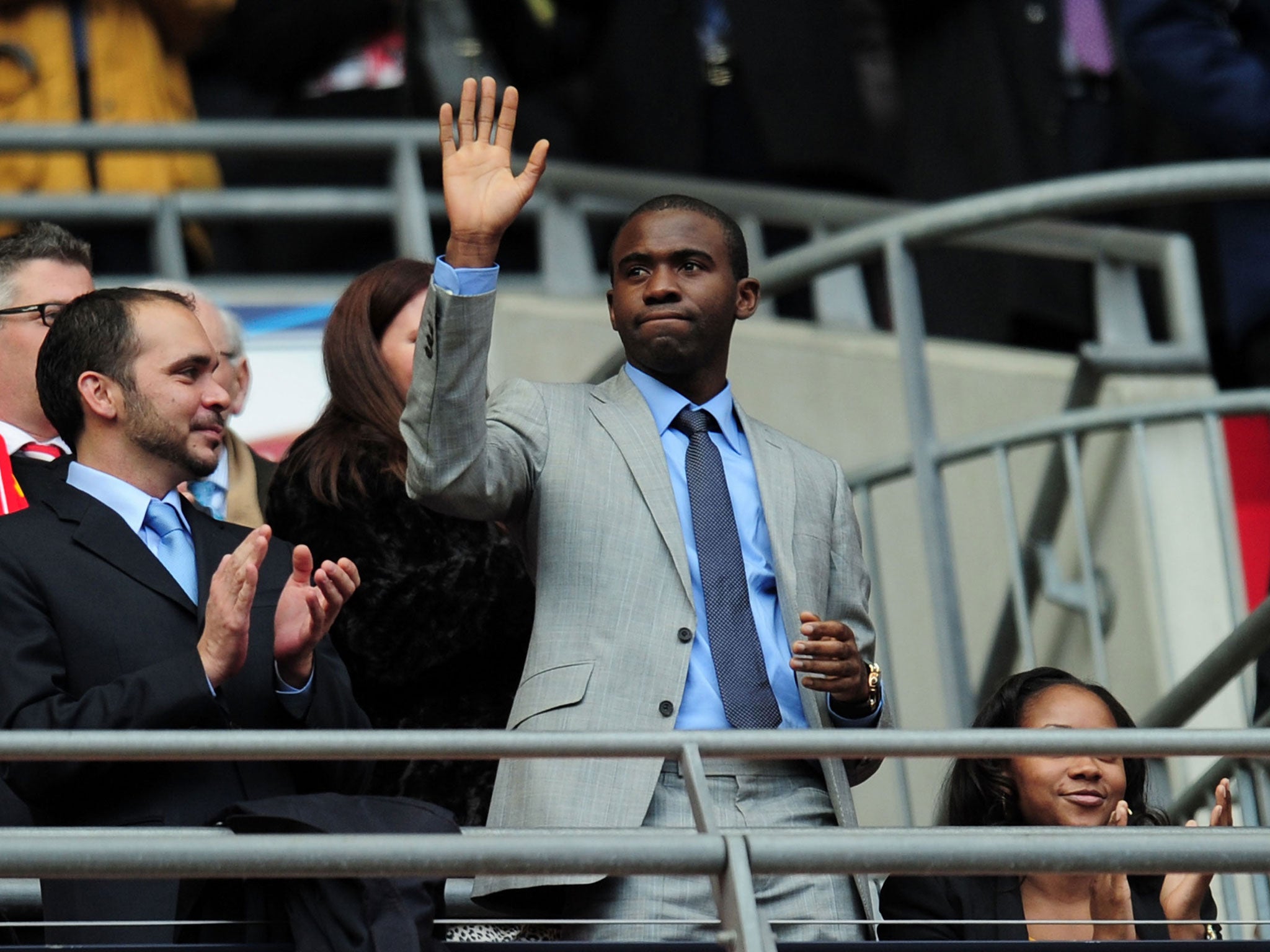 Fabrice Muamba of Bolton waves ahead of the FA Cup with Budweiser Final match between Liverpool and Chelsea