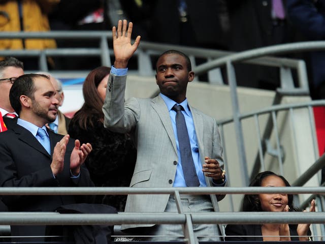 Fabrice Muamba of Bolton waves ahead of the FA Cup with Budweiser Final match between Liverpool and Chelsea