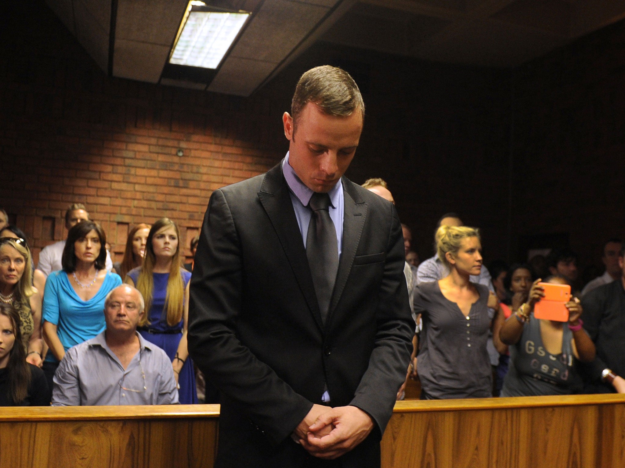 South African Olympic sprinter Oscar Pistorius appears on February 21, 2013 at the Magistrate Court in Pretoria.