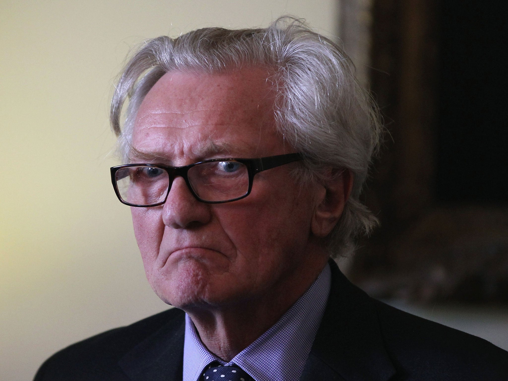 Lord Heseltine listens during a reception at 10 Downing Street on March 27, 2012 in London, England: