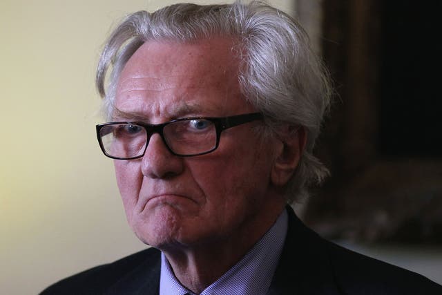 Lord Heseltine listens during a reception at 10 Downing Street on March 27, 2012 in London, England: