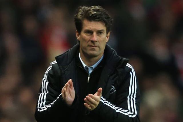 Michael Laudrup has steered his side into the top half of the table