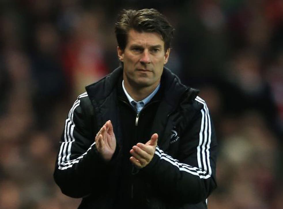 Michael Laudrup has steered his side into the top half of the table