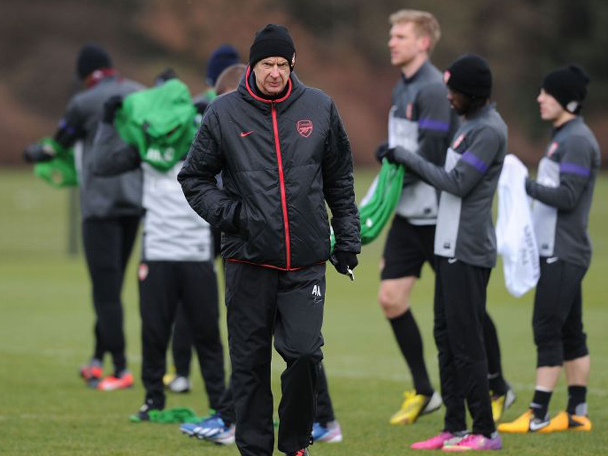 Arsène Wenger during training at London Colney yesterday