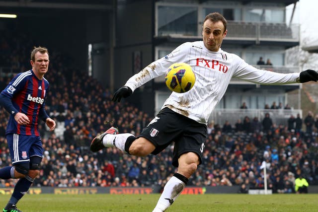 Dimitar Berbatov shoots and scores for Fulham against Stoke
