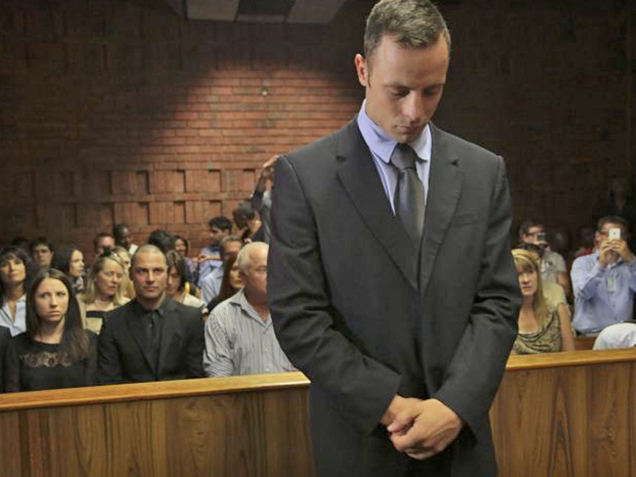 Oscar Pistorius awaits the verdict on his bail hearing on Friday