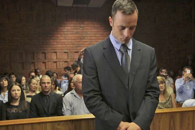 Oscar Pistorius awaits the verdict on his bail hearing on Friday