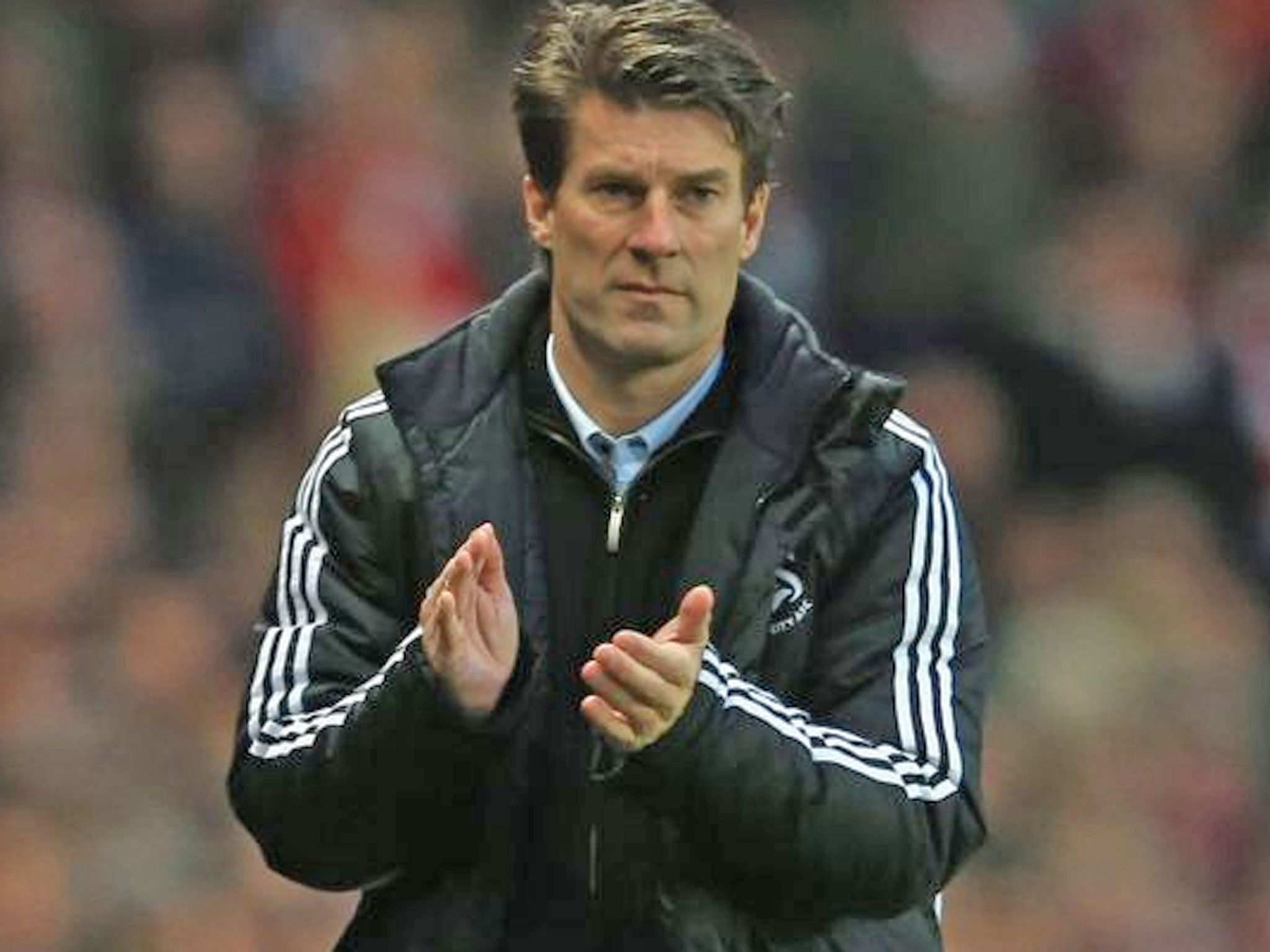 Swansea manager Michael Laudrup said he has no ambition to manage clubs like Real Madrid or Chelsea