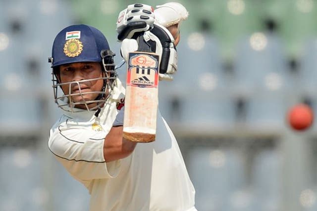 Sachin Tendulkar joined forces with Virat Kohli (50 not out) to guide India to a good position at stumps