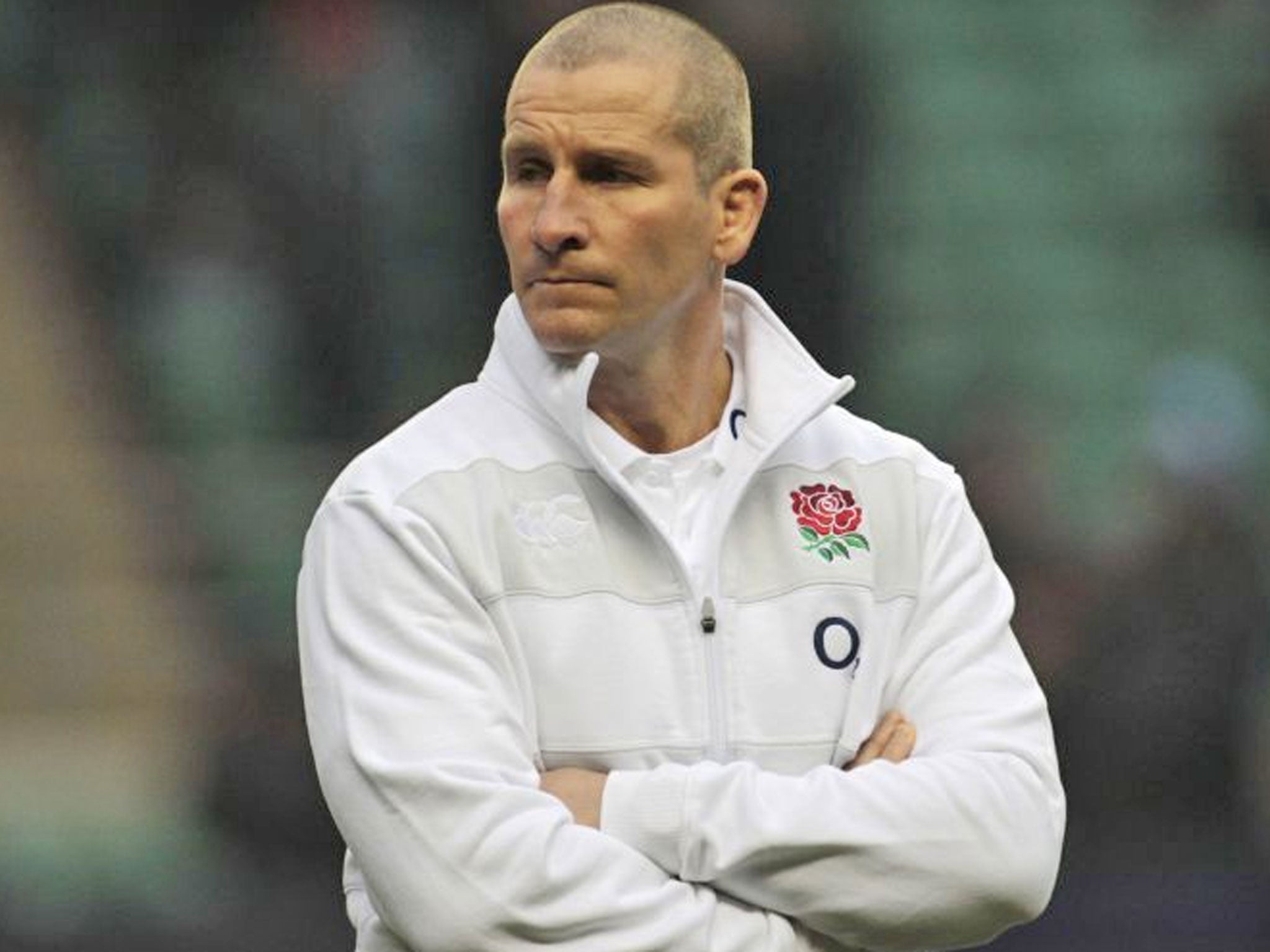 England's head coach Stuart Lancaster watches his team warm up before the start of their Six Nations rugby union match against France