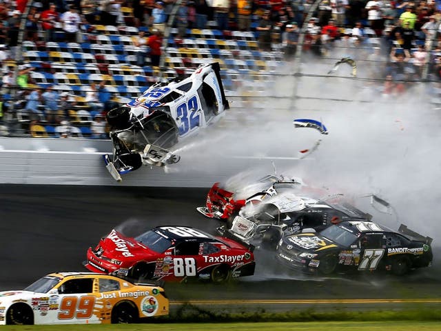 The victims were sprayed with large chunks of debris - including a tyre - after newcomer Kyle Larson's machine hit fencing that is designed to protect the massive grandstands lining Nascar's most famous track.