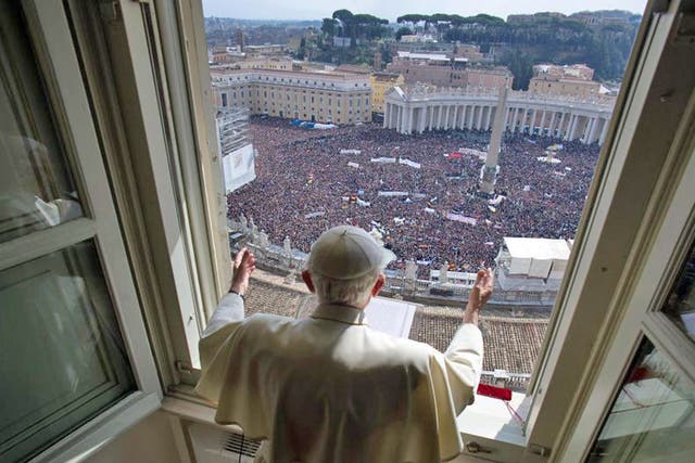 Pope Benedict XVI's leads the Angelus prayer from the window