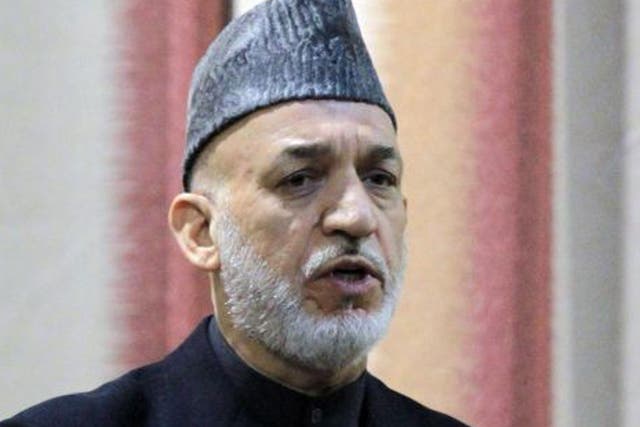 Hamid Karzai: The Afghan President announced move amid torture claims