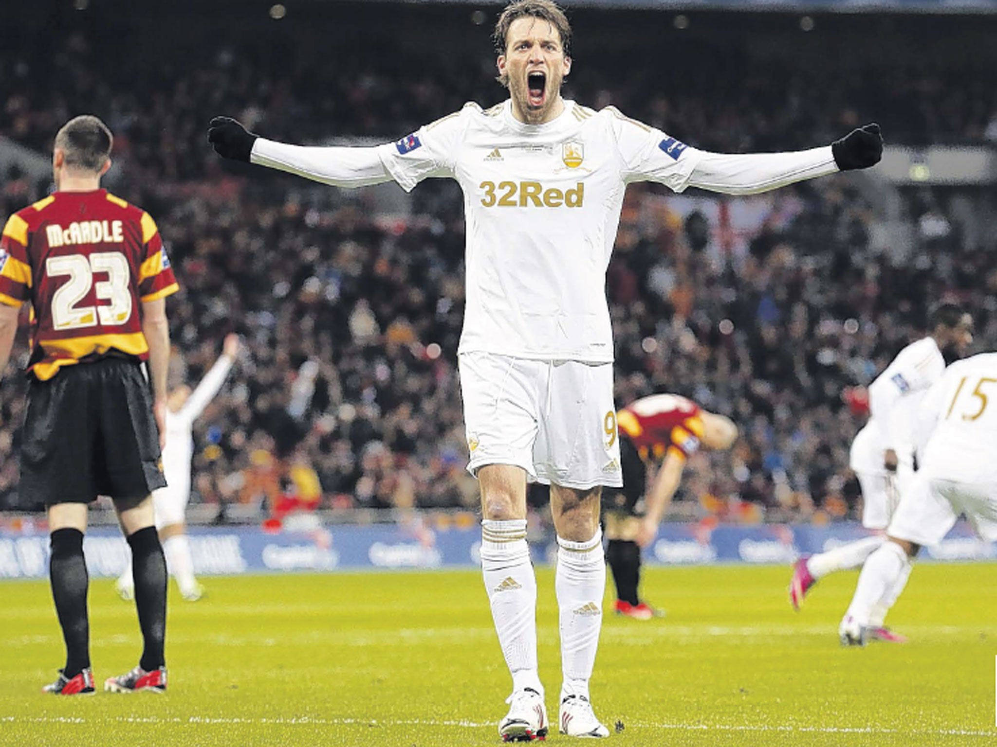 Swansea striker Michu celebrates after Nathan Dyer’s second
goal at Wembley