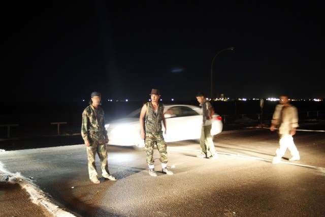 Armed Libyans claiming to be federalist supporters set up a checkpoint outside Sidra oil terminal in 2012