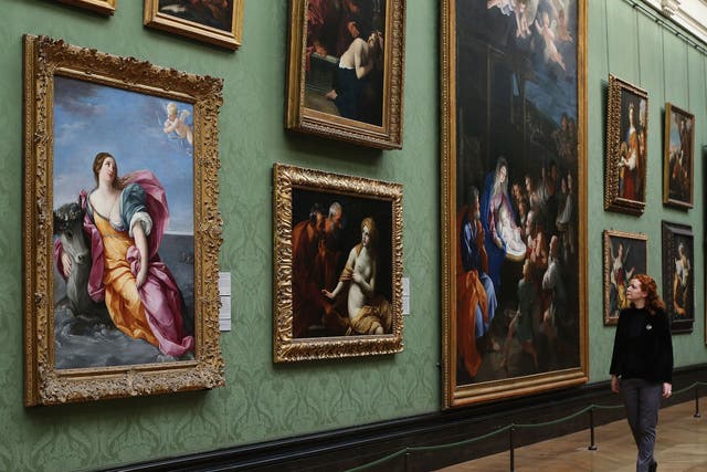 An Italian Baroque masterpiece entitled 'The Rape of Europa' by Guido Reni c.1637 (far left) hangs at the National Gallery on February 19, 2013 in London, England. The painting is one of 57 Baroque masterpieces bequeathed by the late Sir Denis Mahon from his private collection, and will be distributed to museums and galleries across the UK.