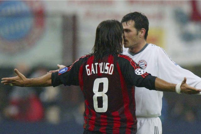 FC Sion's new manager Gennaro Gattuso squres up with Bayern Munich's Willy Sagnol in 2002