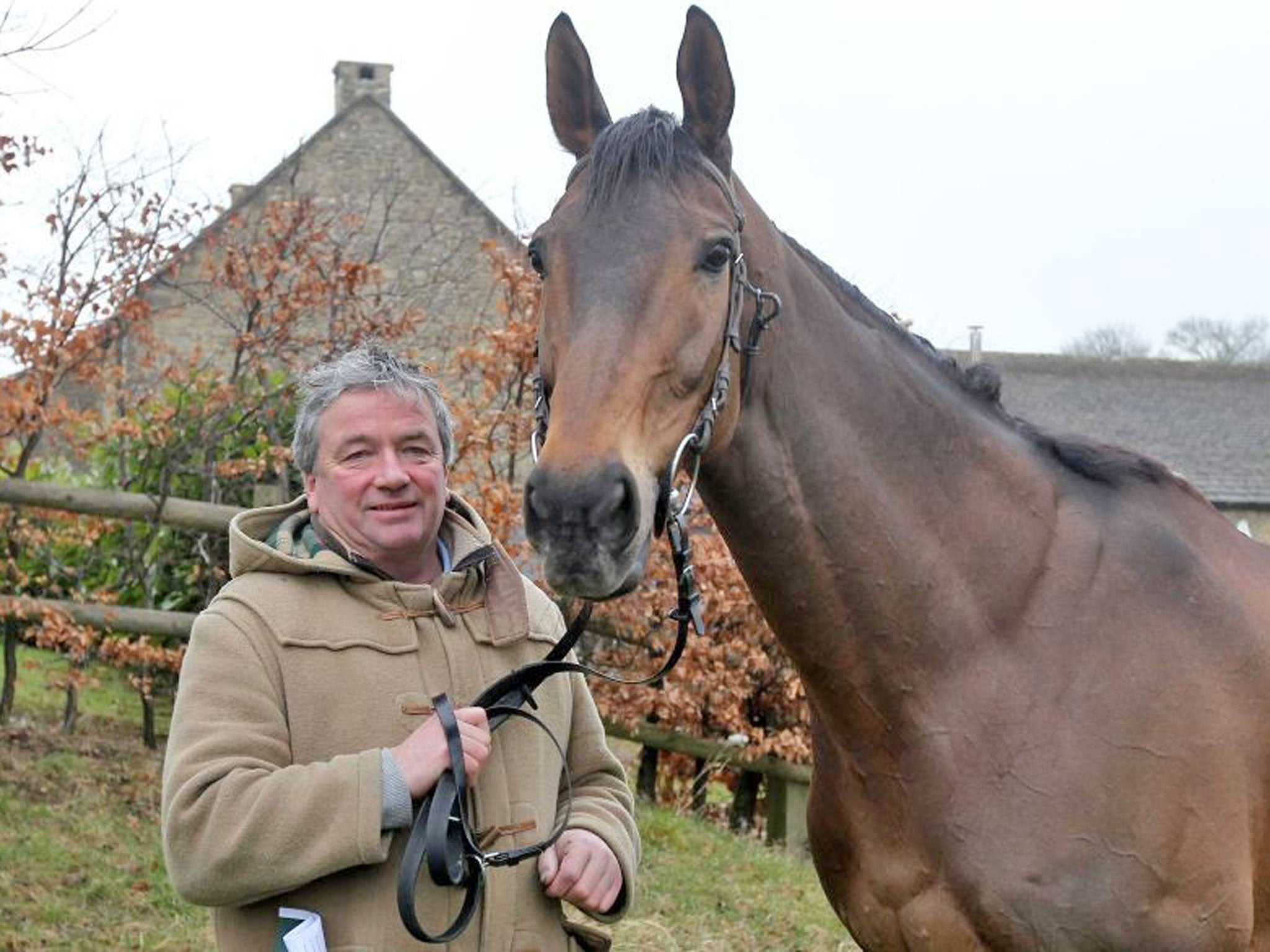 Trainer Nigel Twiston-Davies and Imperial Commander at Grange
Hill Farm yesterday