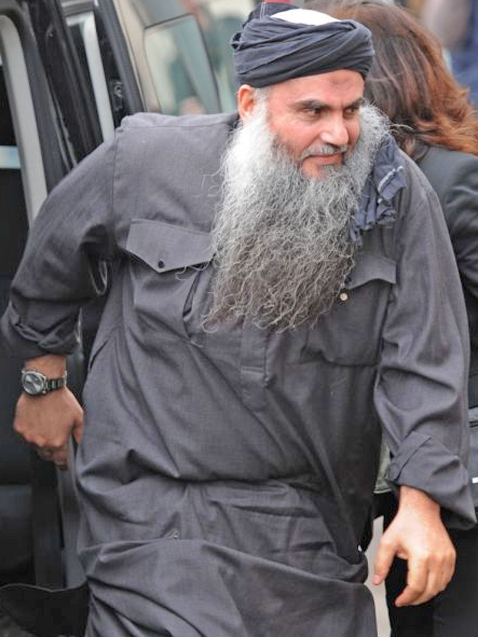 The family of the radical preacher Abu Qatada has won an injunction preventing protesters from demonstrating outside their home