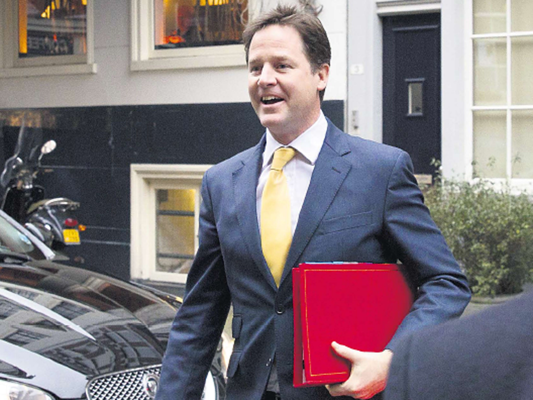 Nick Clegg arrives at a meeting in Amsterdam
