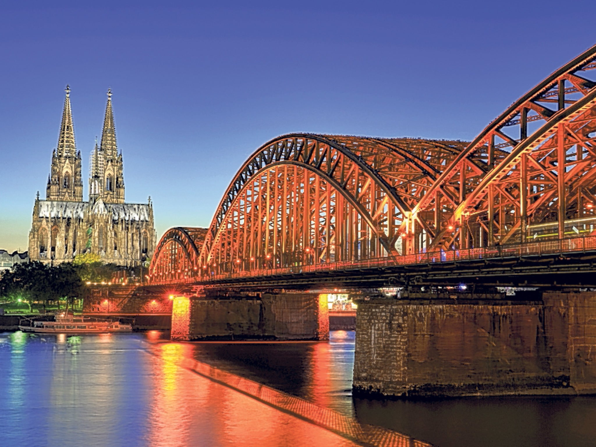 Why settle for one city, says Simon who suggests using the Rhine as a base to explore Dusseldorf, Cologne, pictured, and Bonn