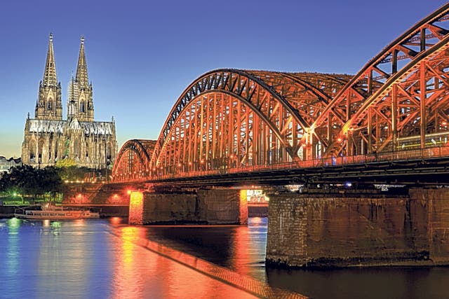 <p>Why settle for one city, says Simon who suggests using the Rhine as a base to explore Dusseldorf, Cologne, pictured, and Bonn </p>
