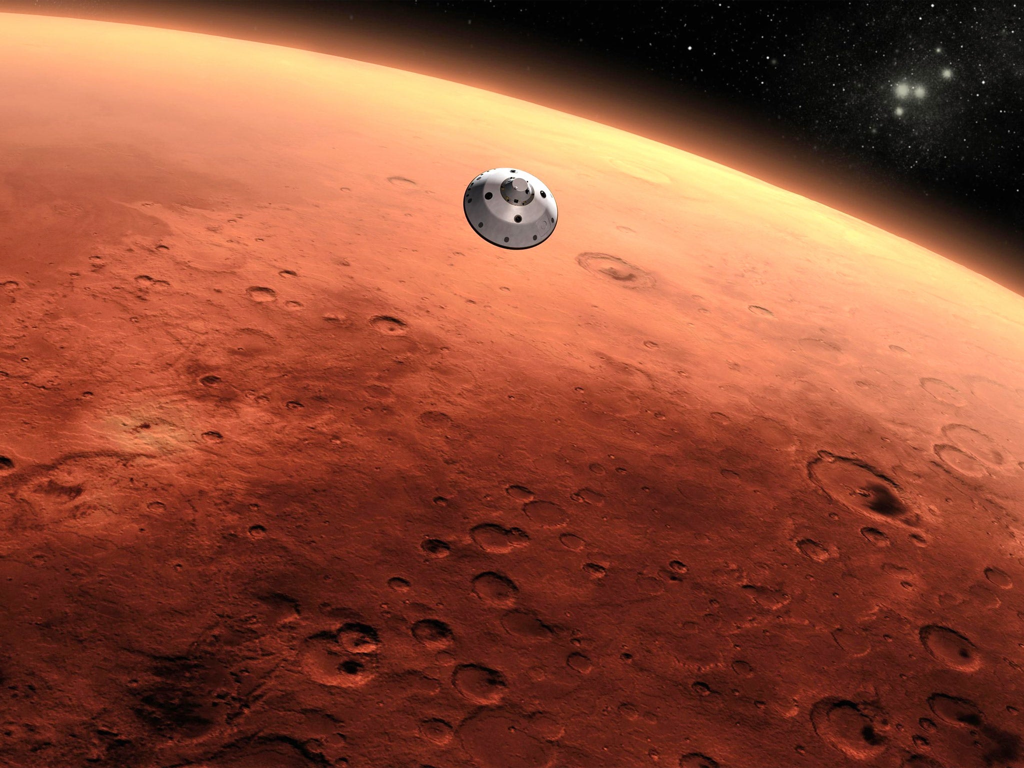 An artist's illustration of a spacecraft approaching Mars